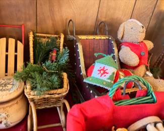 Christmas teddy bear, wicker baskets, holiday greenery and decor