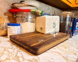 Kitchen canisters, cutting boards, and supplies
