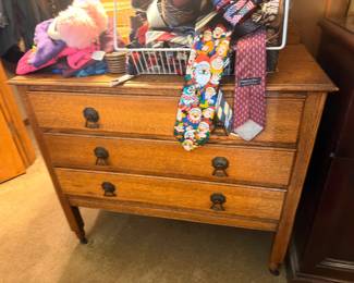 Antique oak three-drawer chest, ties and accessories