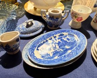 Blue Willow china plates, cups, and creamer