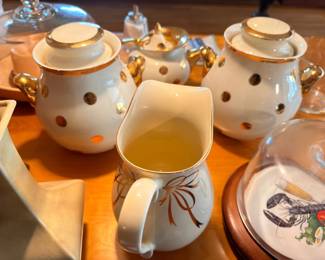 Vintage ceramic tea set with gold polka dot pattern