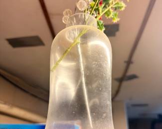 Large clear glass demijohn bottle vase with dried flowers