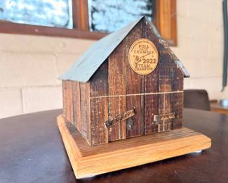 Handmade rustic wood birdhouse with tin roof