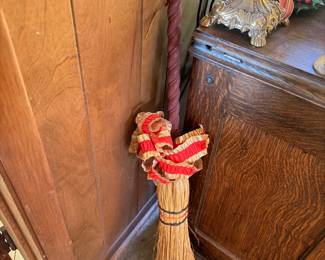 Decorative cinnamon broom with ribbon bow