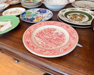 Red transferware plates and assorted vintage decorative china