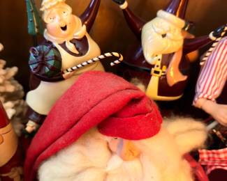 Christmas elf figurines, gnomes, and Santa hat holiday decor