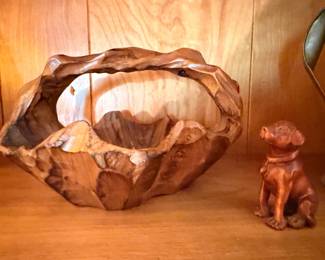 Carved wooden burl sculpture with bear figurine