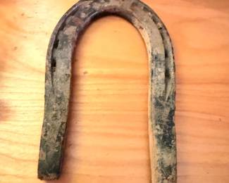 Antique hand-forged iron horseshoe