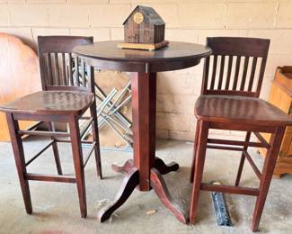 Pub height round pedestal table with 4 bar stools