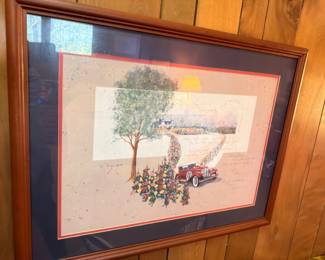 Framed country landscape print with red truck and flowers