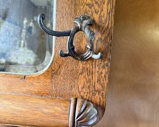 Hall tree detail, cast iron double coat hook
