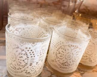 Decorative glass candle holders with lace wraps