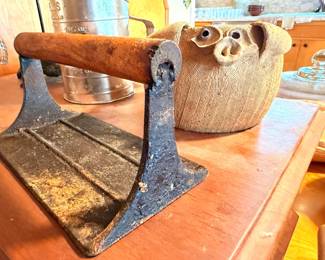 Antique cast iron cobbler's shoe last and ceramic owl figurine