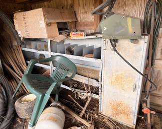 Wheelbarrow, ladder, and outdoor yard tools