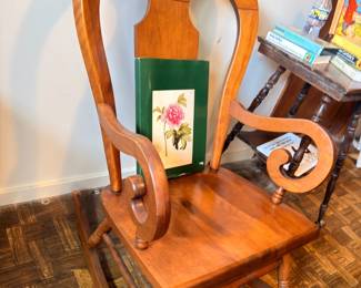 Wooden arm chair with heart-shaped back