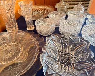Crystal relish dishes, covered jars, and pressed glass bowls