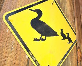 Yellow duck crossing road sign metal vintage