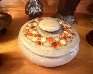Vintage ceramic covered casserole dish with floral pattern