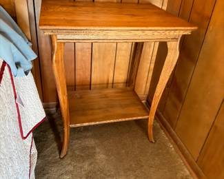Oak side table with lower shelf