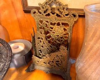 Ornate brass decorative easel stand and pewter candle holder