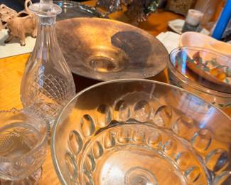 Crystal glass decanter, silver serving tray, and glassware collection