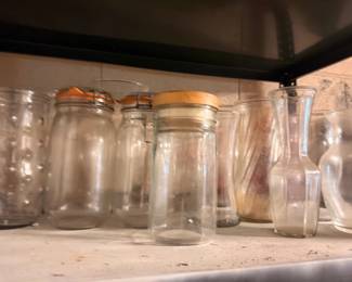 Vintage glass storage jars and bottles collection