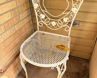 White wrought iron patio chair scrollwork vintage