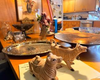 Ceramic pig figurine, wooden bowls, silver tray, and collectibles