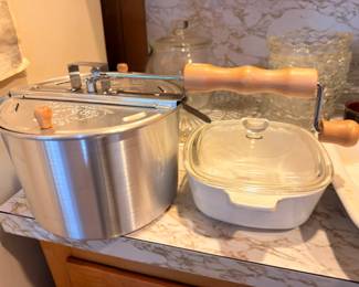Vintage stock pot, glass casserole dish, and kitchen utensils