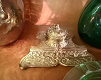 Antique ornate brass inkwell with hinged lid