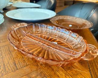 Pink depression glass handled bowl and serving plates