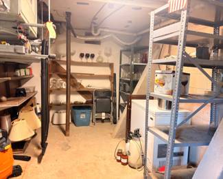 Garage workshop metal shelving, storage bins, tools