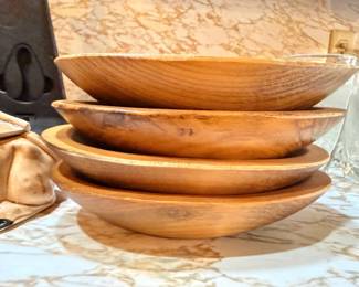 Stacked wooden salad bowls, set