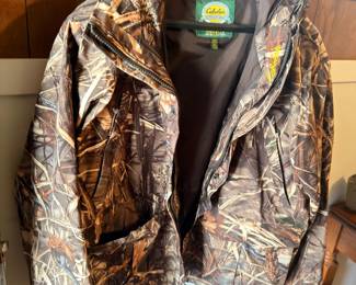 Camo hunting jacket, trucker cap