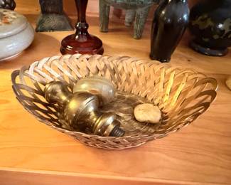 Brass decorative bowl with polished stones