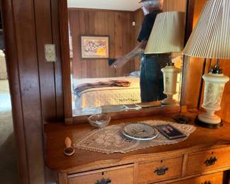 Antique oak secretary desk hutch with lamp and collectibles