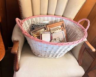 Upholstered accent chair with wicker basket