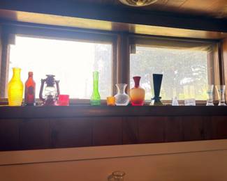 Vintage colored glass bottles and vases collection