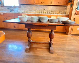 Antique turned-leg kitchen table with china and dish sets