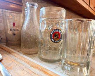 Paulaner Munchen beer stein, Michelob glass, and barware