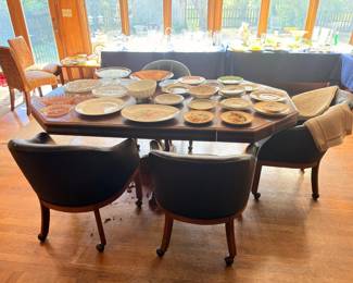 Dining table with upholstered chairs and china set