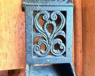 Antique cast iron wall match holder, ornate scrollwork