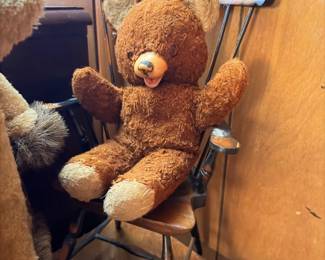 Large vintage teddy bear and folding director's chair
