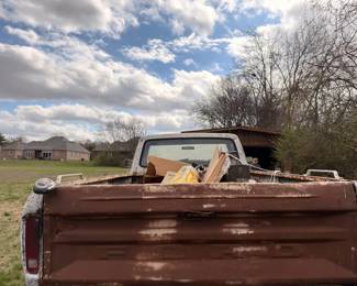Vintage Ford pickup truck, rear view with loaded bed
