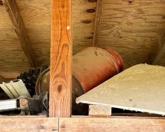 Barn loft storage, metal drum, bench grinder, and misc hardware