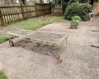 Vintage wrought iron patio chaise lounge with wheels