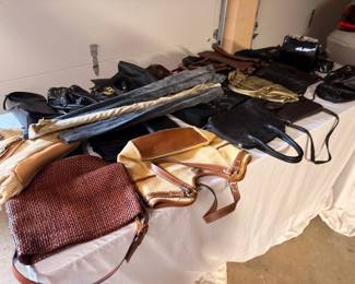 Assorted handbags, purses, and umbrellas lot