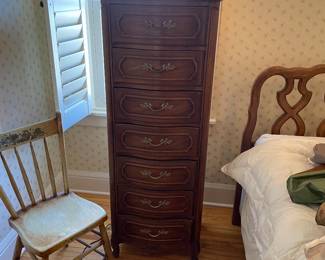 tall dresser in bedroom