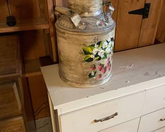 Old dresser with milk can