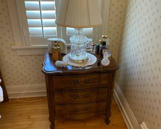 Nightstand, lamp, perfume bottles